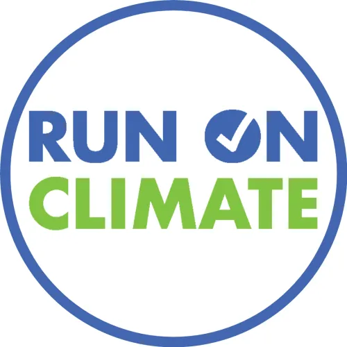 A blue circle with a white interior with the words "Run On Climate" inside